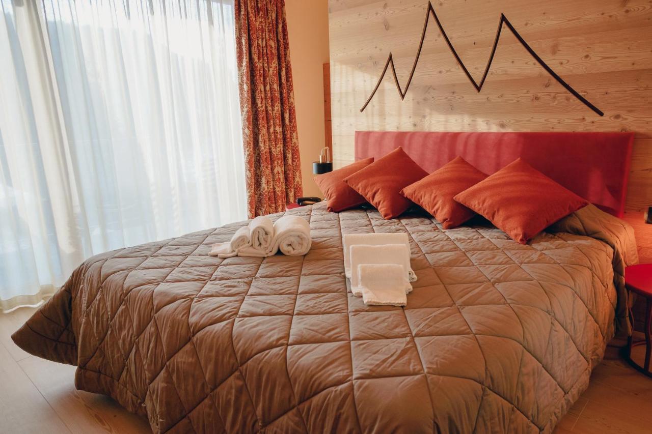Hotel La Perla Andalo Bagian luar foto